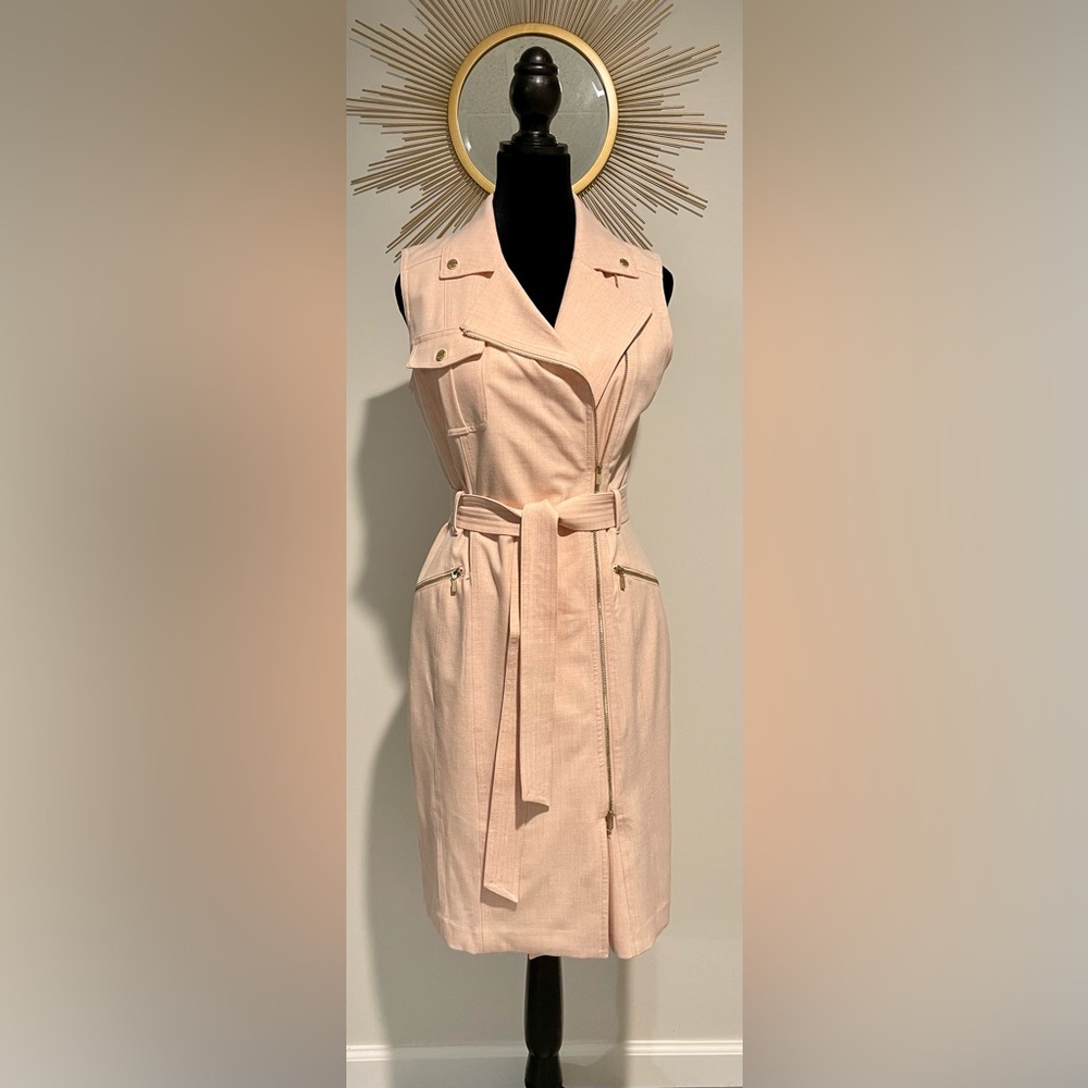 Calvin Klein light pink wrap dress. Size 6. Brand new condition.